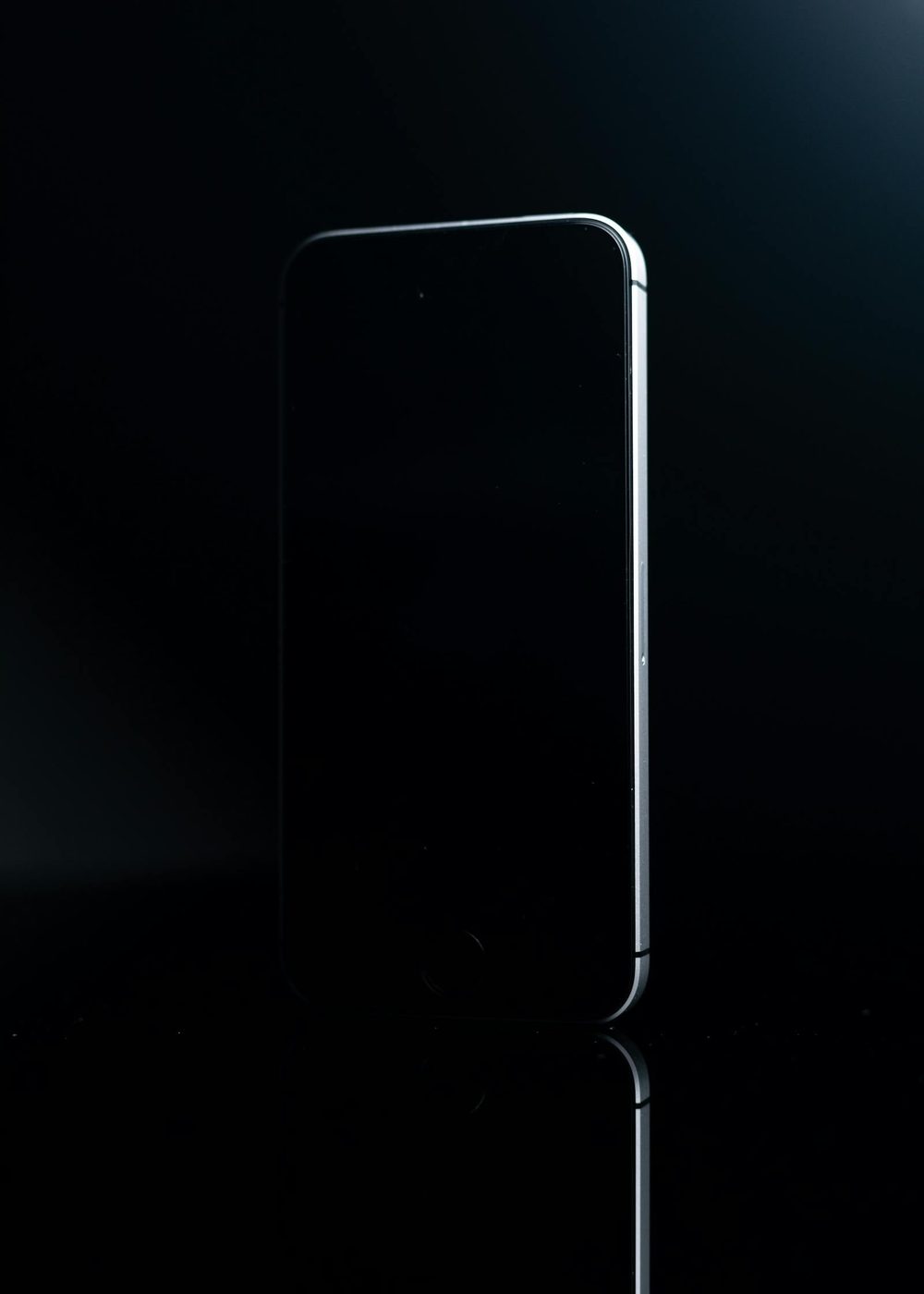 Refurbished iPhone category with a premium smartphone on a dark background